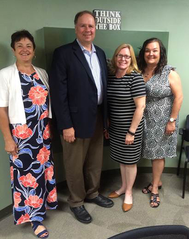 photo of Representative Gunther, Alan Augustin and Amber Elliott